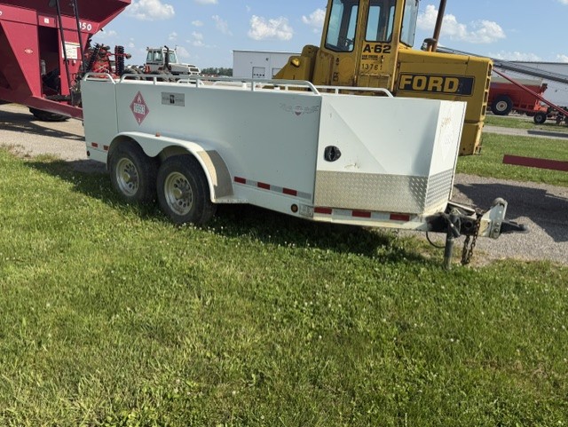 Case IH corn head mounted on transport trailer